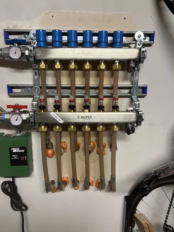 Plumber performing Gas Line Installation at a residential property in Ware